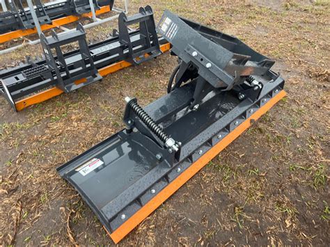 wolverine skid steer dozer blade|wolverine skid steer attachments.